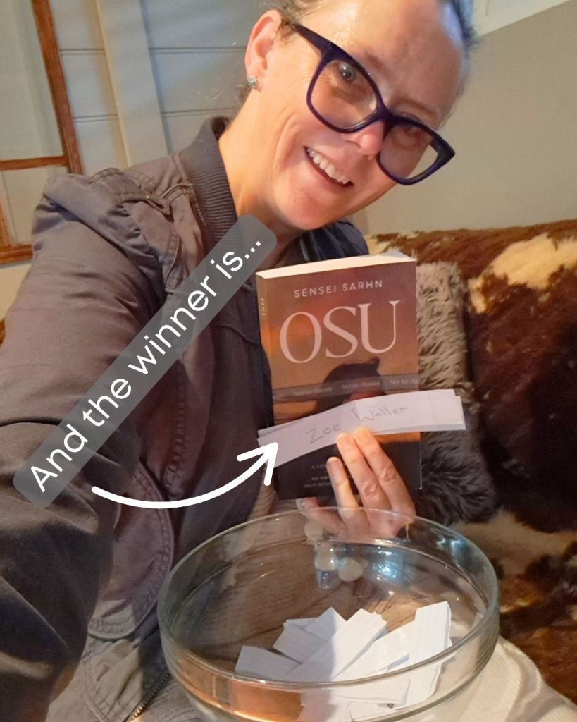 Sensei Sarhn holds first printed copy of her teen YA empowering fiction novel 'Osu'. Winners name is announced, who will receive this copy.